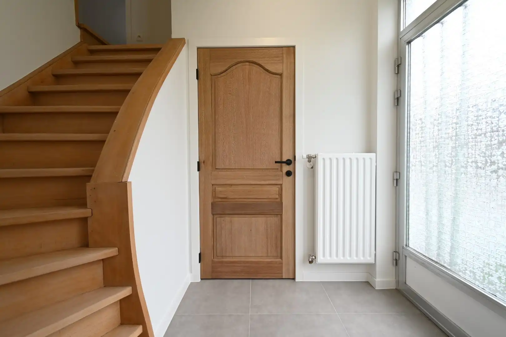 Zorgvuldig gerenoveerde vrijstaande woning met veranda en leuke tuin op 5a24ca te Munsterbilzen foto 4