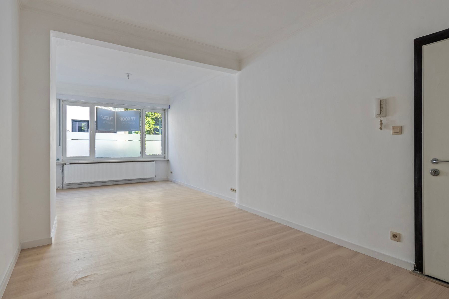 Instapklaar 1-slaapkamerappartement met ruime tuin. foto 2