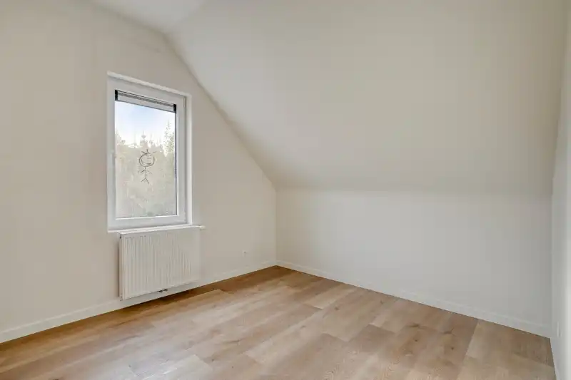 Ruime en instapklare woning met 4 slaapkamers en tuin foto 8