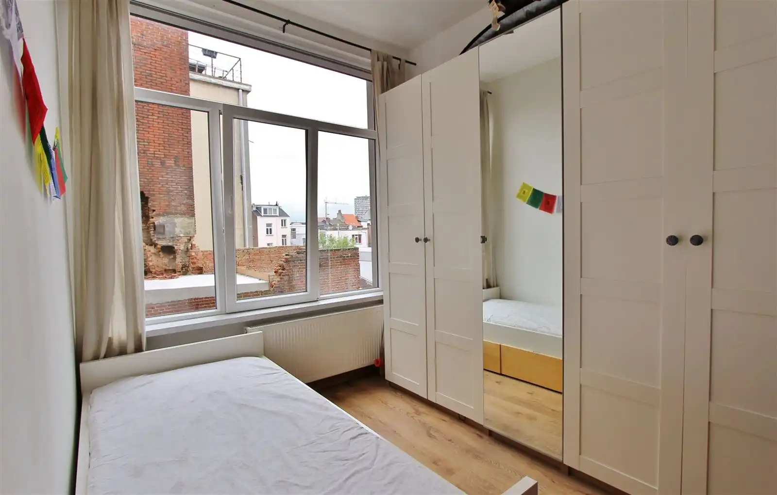 Instapklaar 2 SLPK appt met tijdloos interieur, karaktervol gebouw, veel lichtinval, lage kosten en ligging zijn absolute troef! foto 7