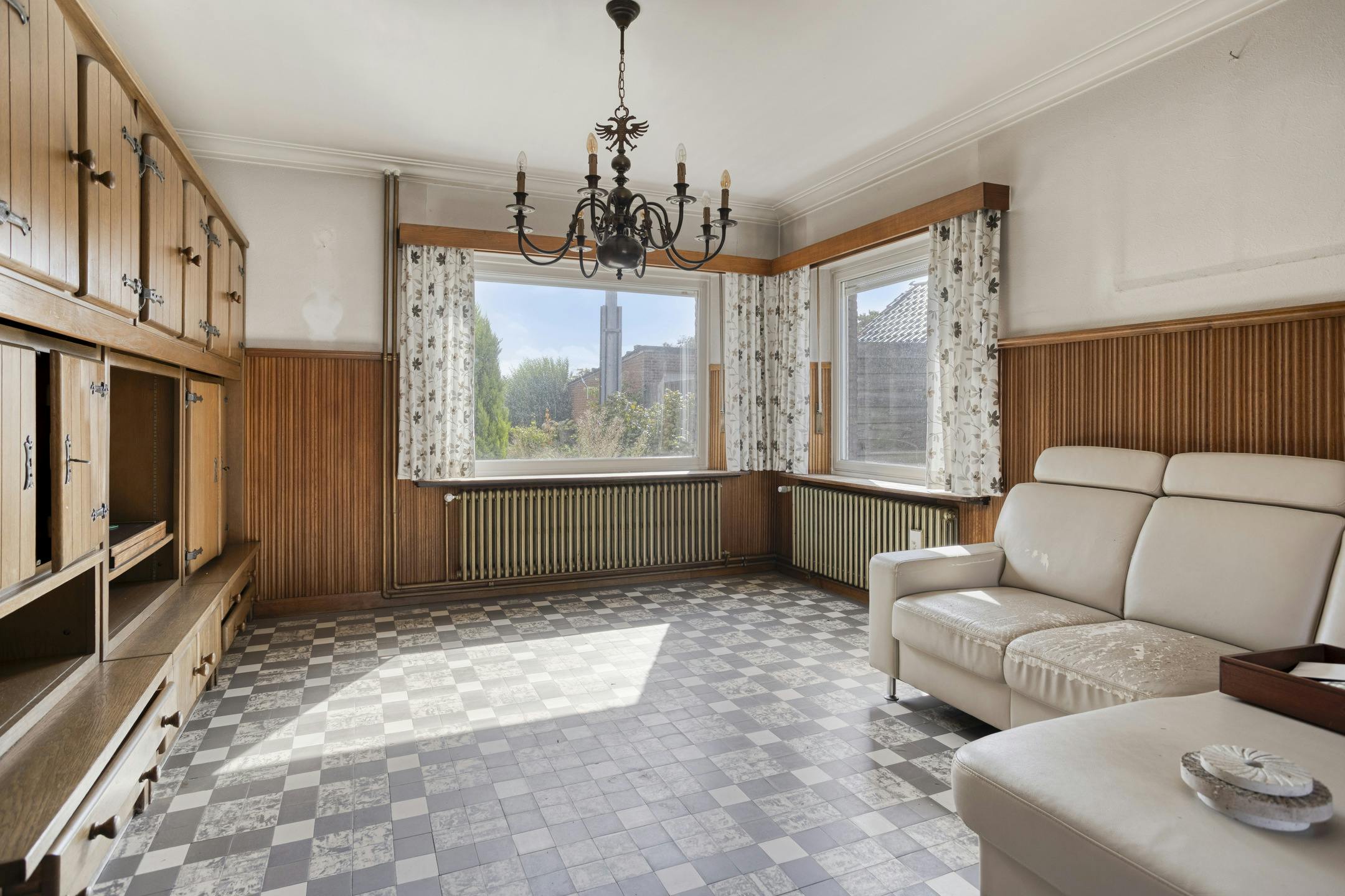 Te renoveren woning te koop net buiten het centrum van Retie foto 4