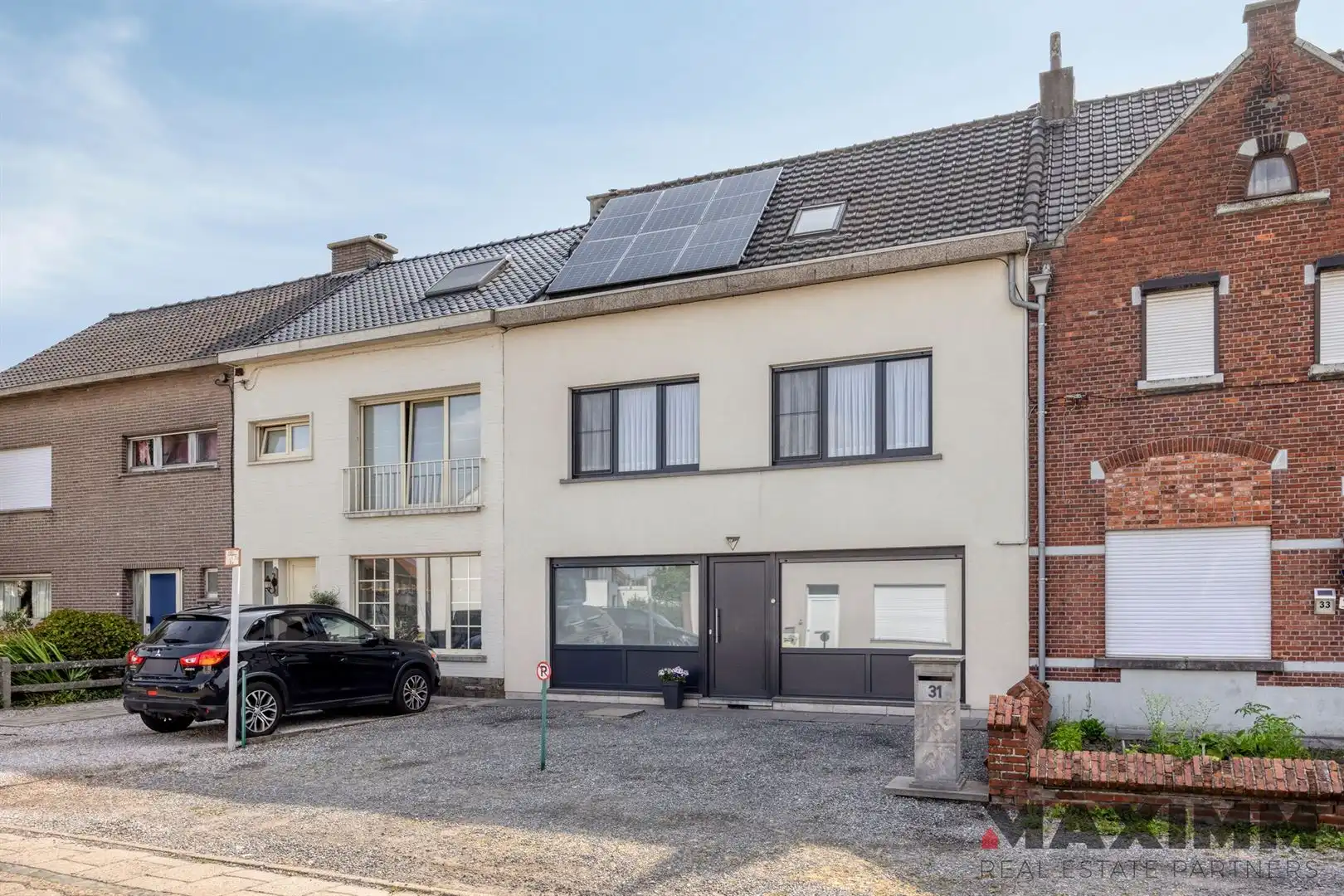 Instapklare en uitstekend onderhouden gezinswoning met EPC B, 3 slaapkamers, ruime hobbyruimte, zonnepanelen en garage foto 2