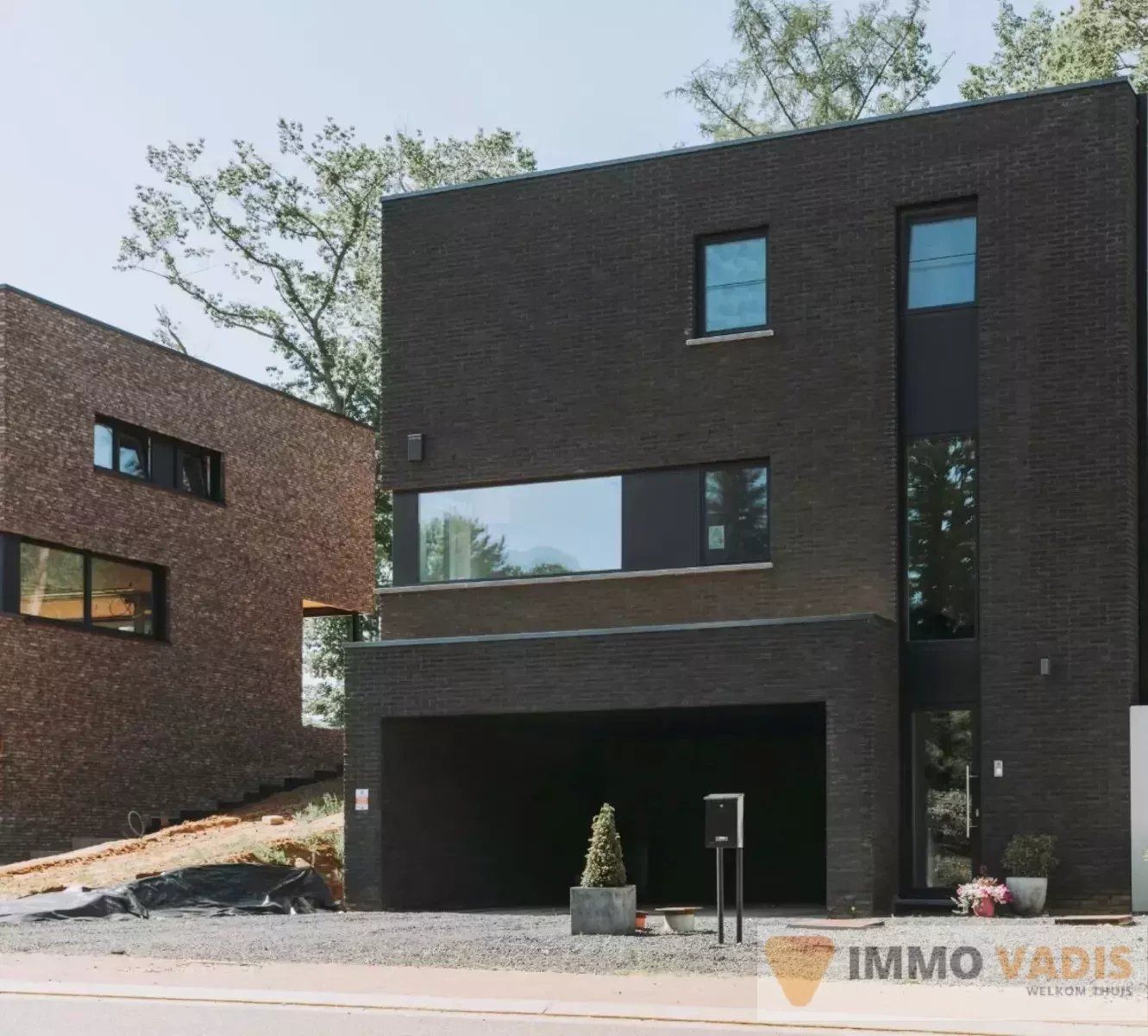grond met nieuwbouwwoning foto 3