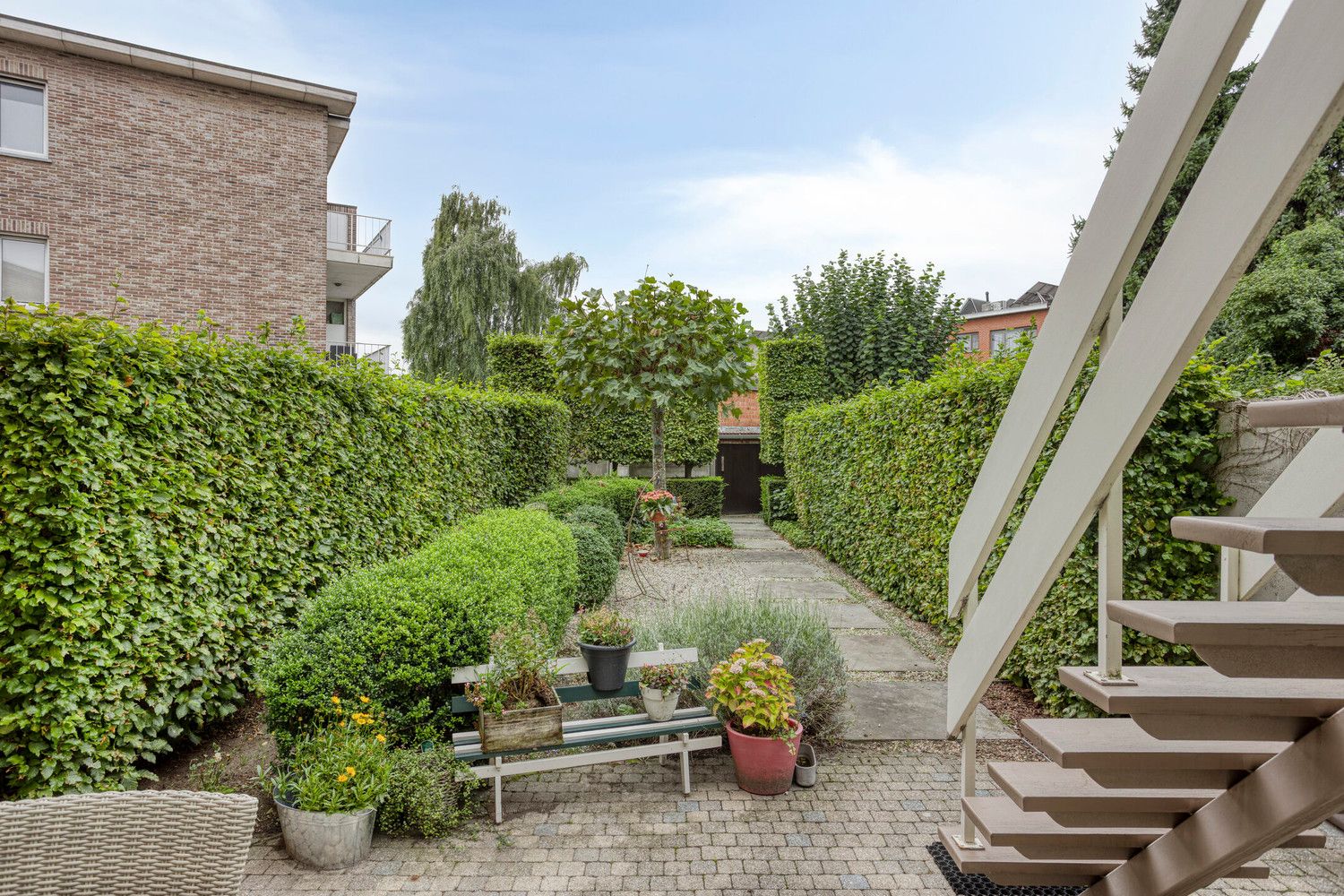 Mooie bel-étagewoning met 3 slks, garage, zomerkeuken en tuin! foto 38