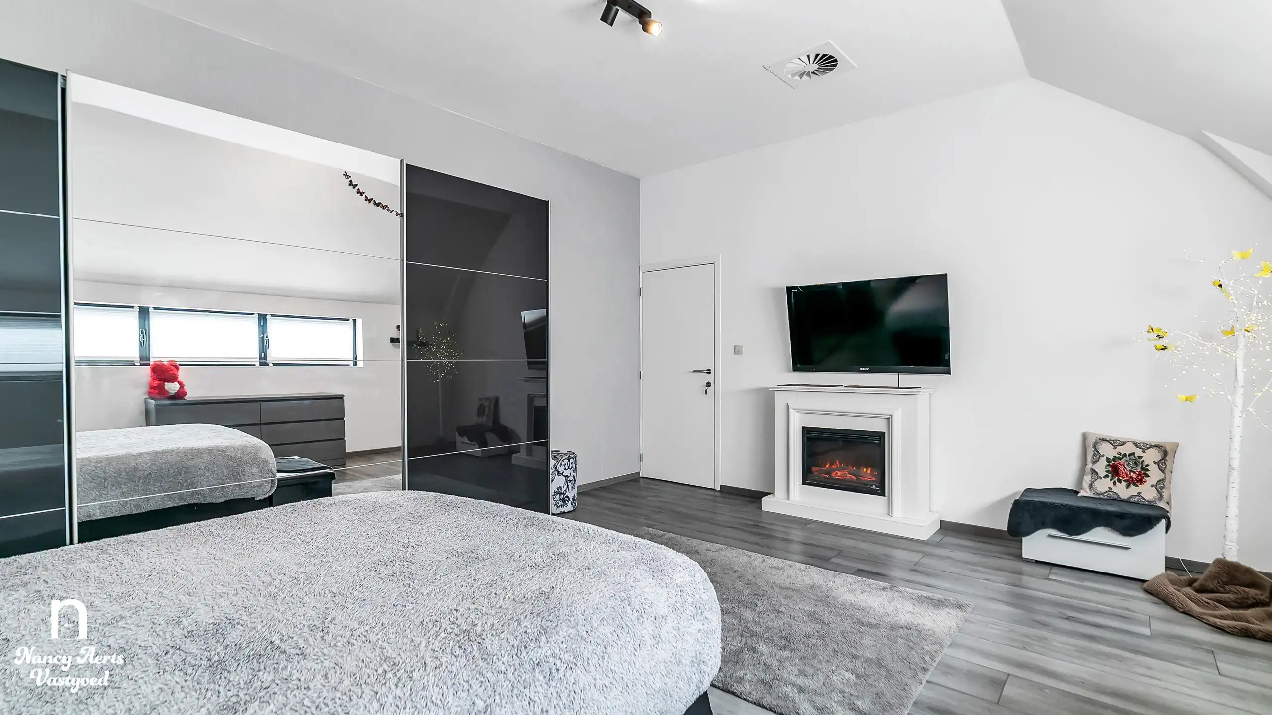 Karaktervolle duplex met loftgevoel en tuin in Zonhoven foto 12