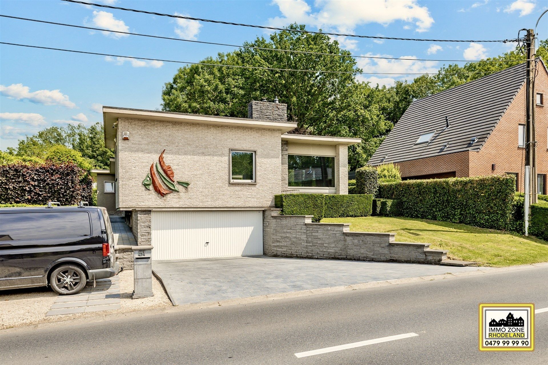 Unieke architecturale open woning in u-vorm met mooie tuin foto 3