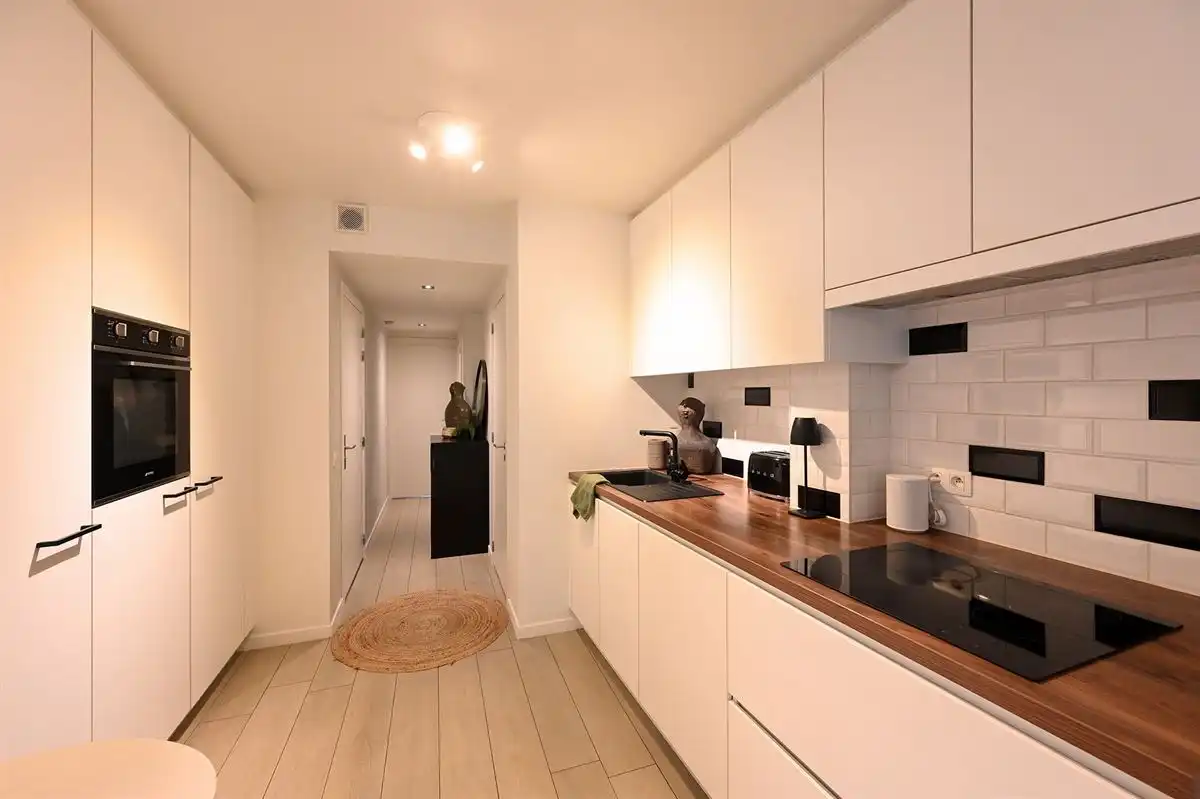 Instapklaar gelijkvloersappartement met heerlijke stadstuin foto 9