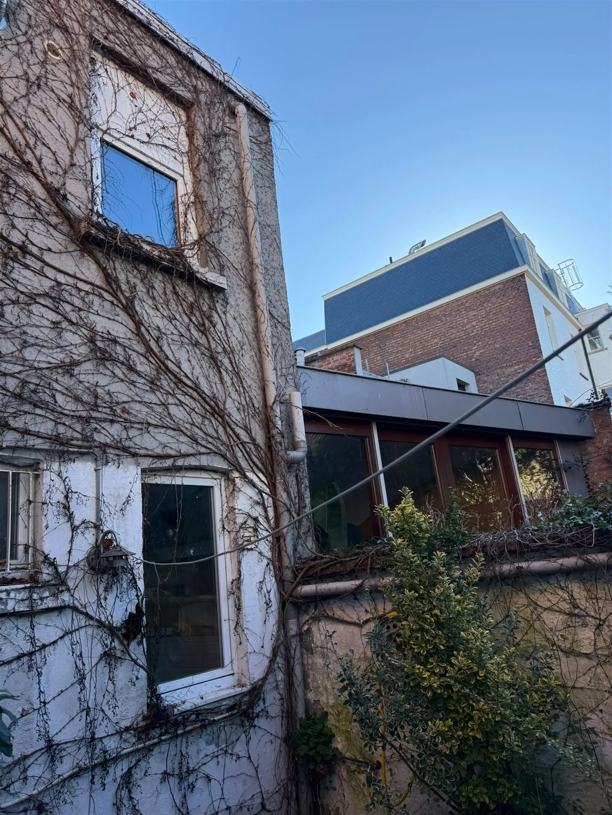 Geacht vergund opbrengsteigendom met stadstuin foto 9