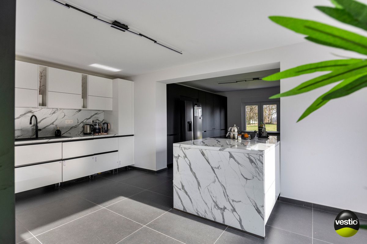 RUIME RUSTIG GELEGEN WONING MET 3 SLK EN POLYVALENT BIJGEBOUW OP 23A75CA. foto 15