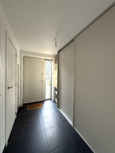 Rustig gelegen woning met mooie tuin en carport foto 7