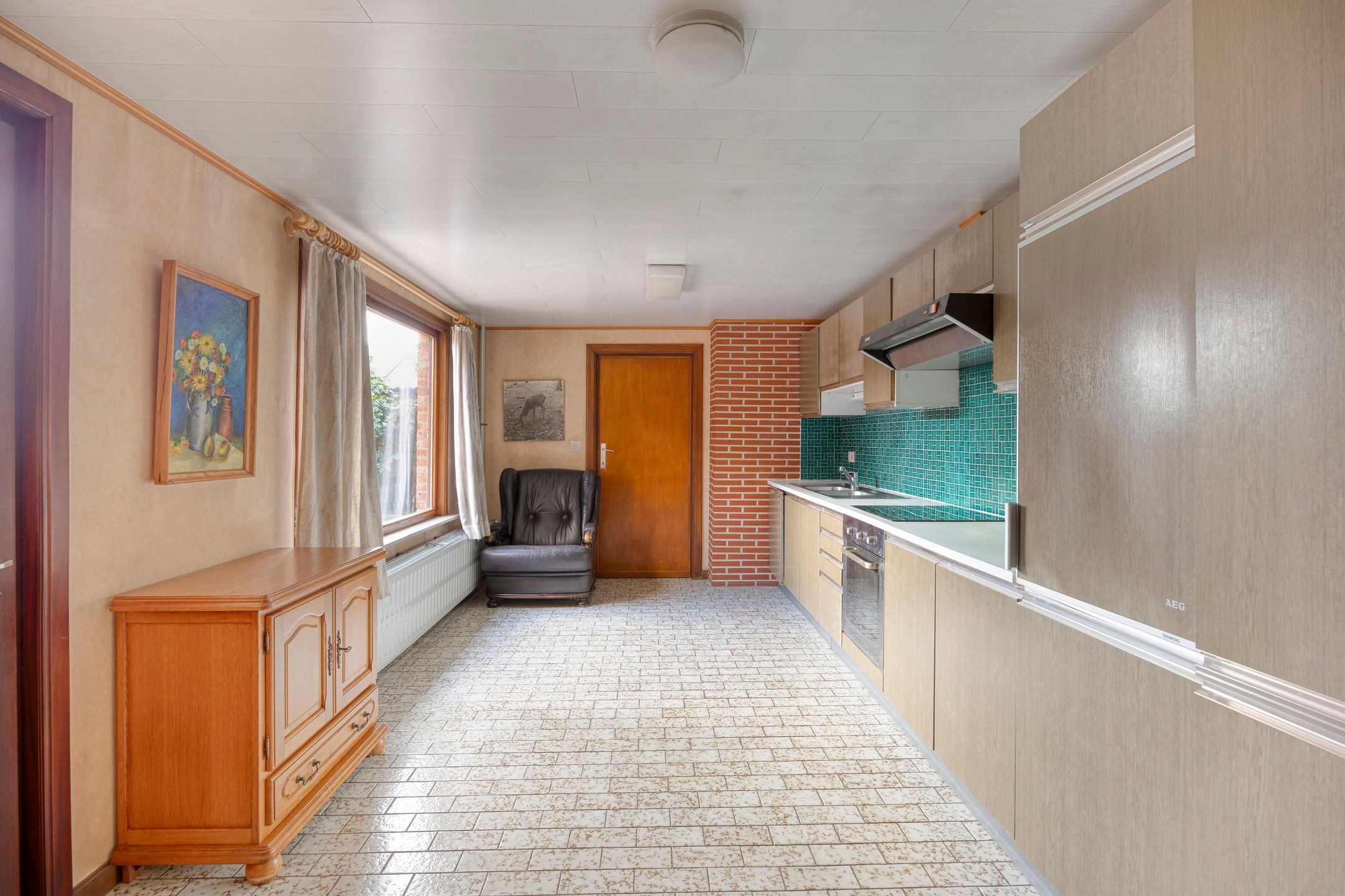 Te renoveren woning op centrale ligging in Wezemaal foto 6