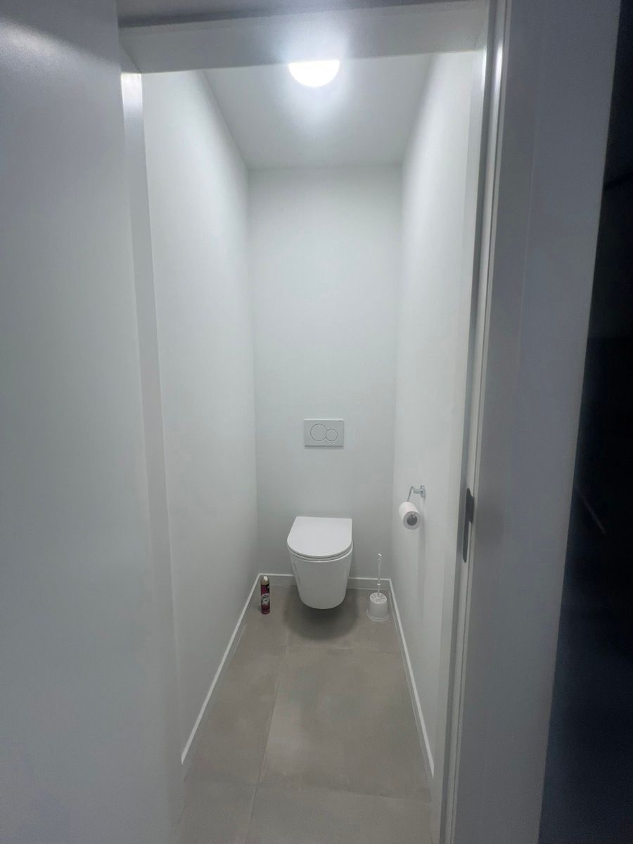 Instapklare nieuwbouwwoning met tuin en carport foto 11