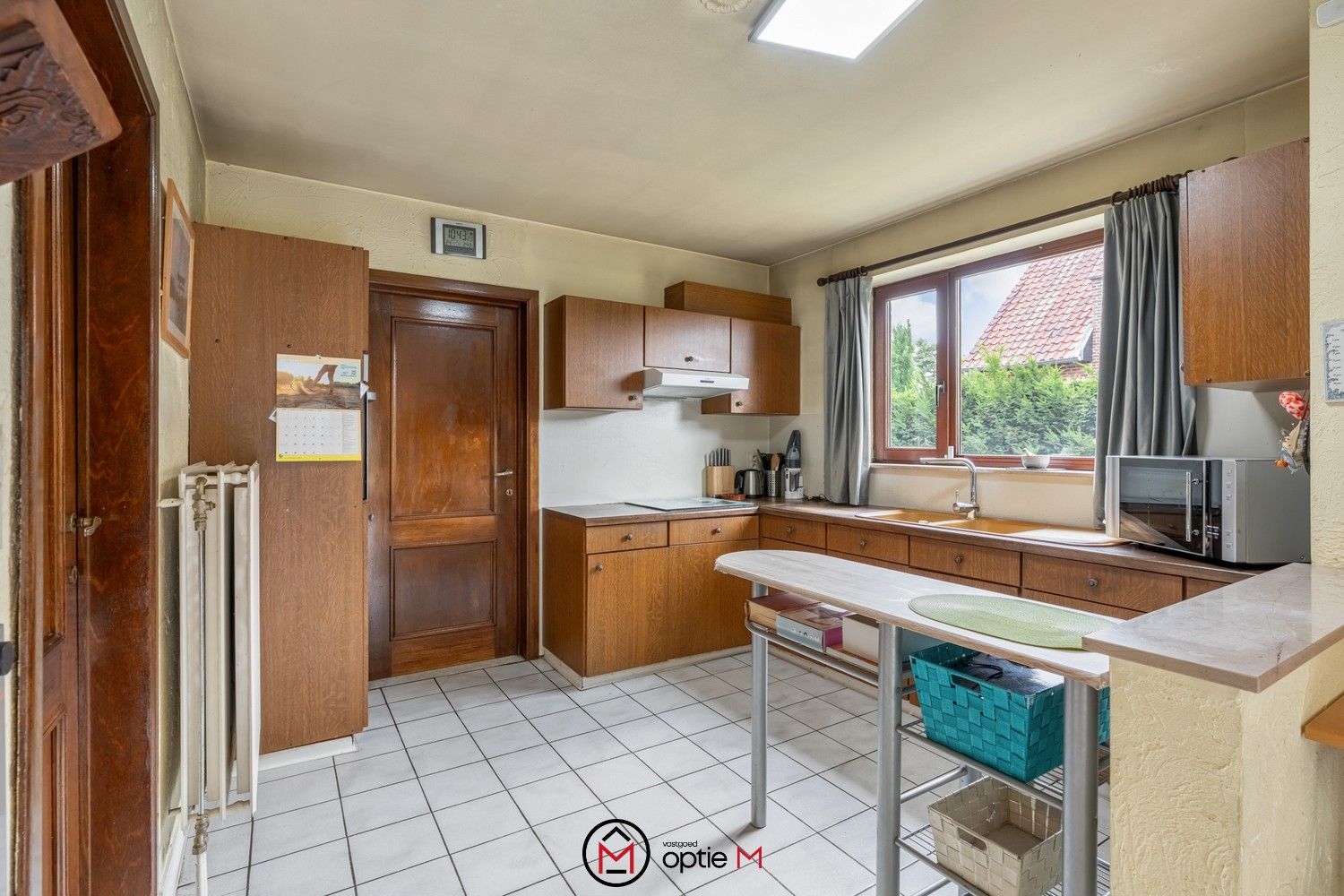 Rustig gelegen gezinswoning met 4 slaapkamers en ruime tuin foto 9
