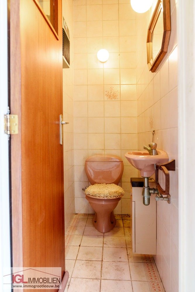 Tweegevel met veel potentieel te koop in Halle foto 17