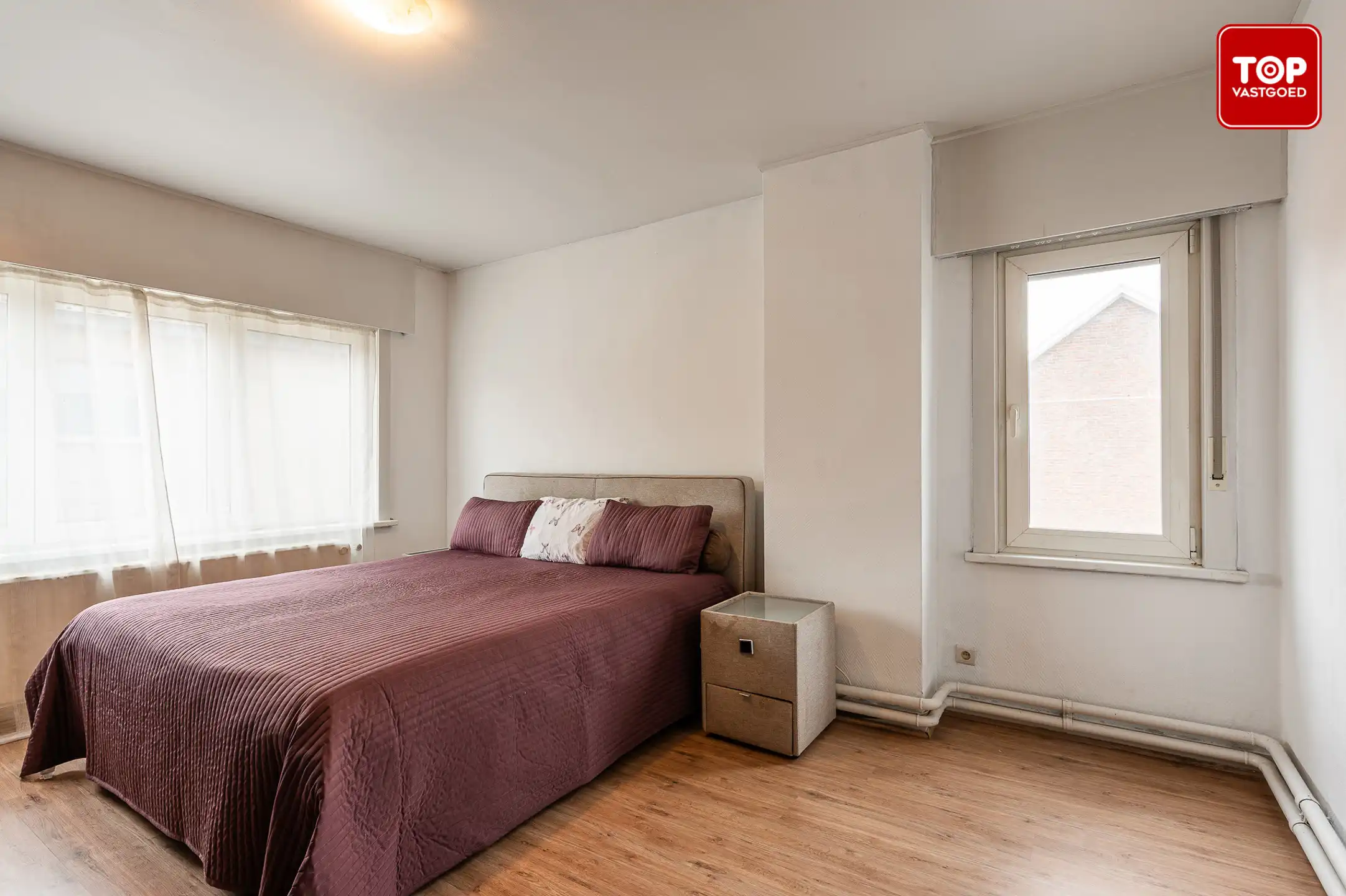 Instapklare woning met 4 slaapkamers en tuin in het hart van Sleidinge foto 18