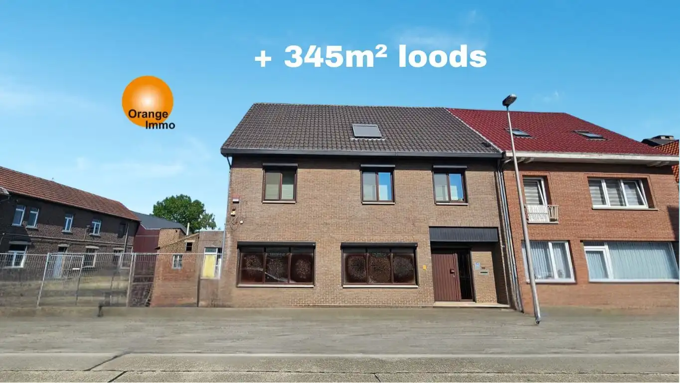 Handelshuis met 5 slaapkamers en grote loods/garage/opslagplaats in Maasmechelen foto {{pictureIndex}}