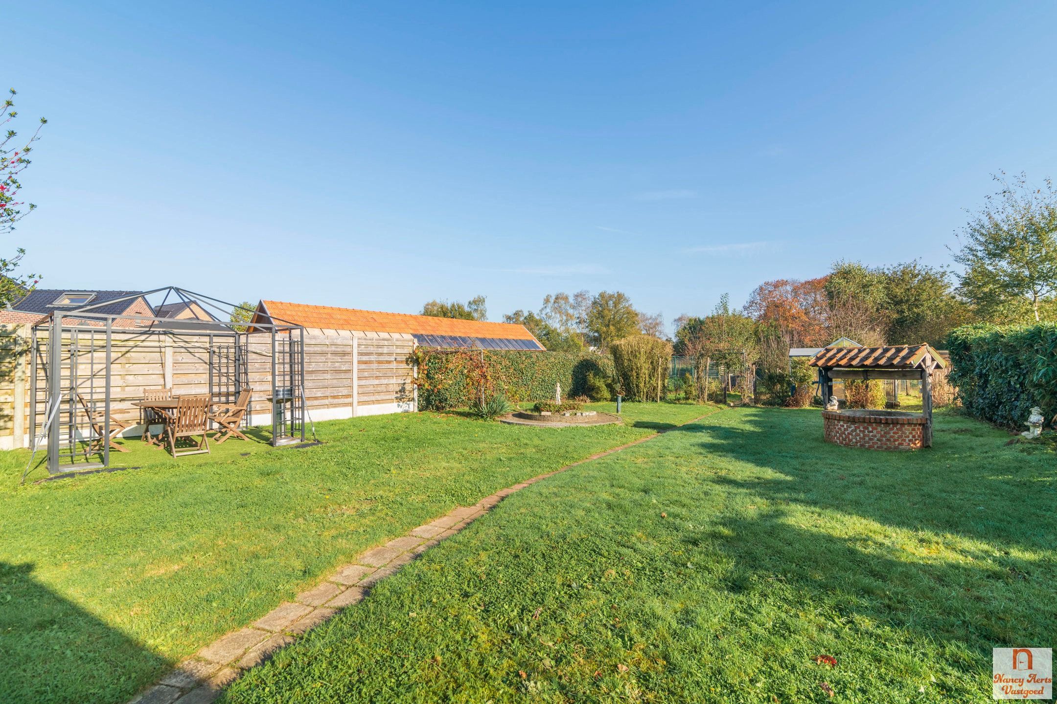 Sfeervolle gezinswoning met zonnige tuin in Paal foto 5