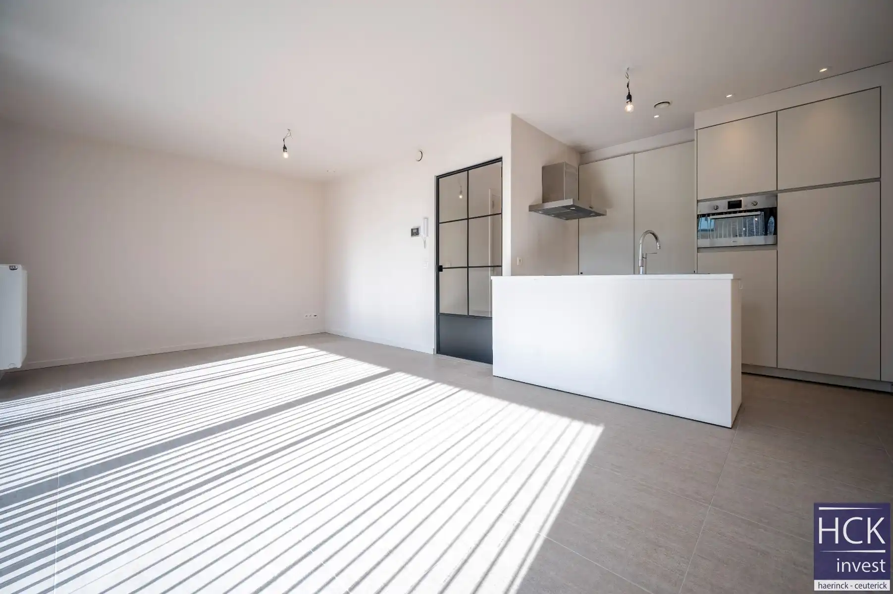 KRUISHOUTEM - Lichtrijk & ruim gelijkvloersapp. + terras op de Marolle foto 4