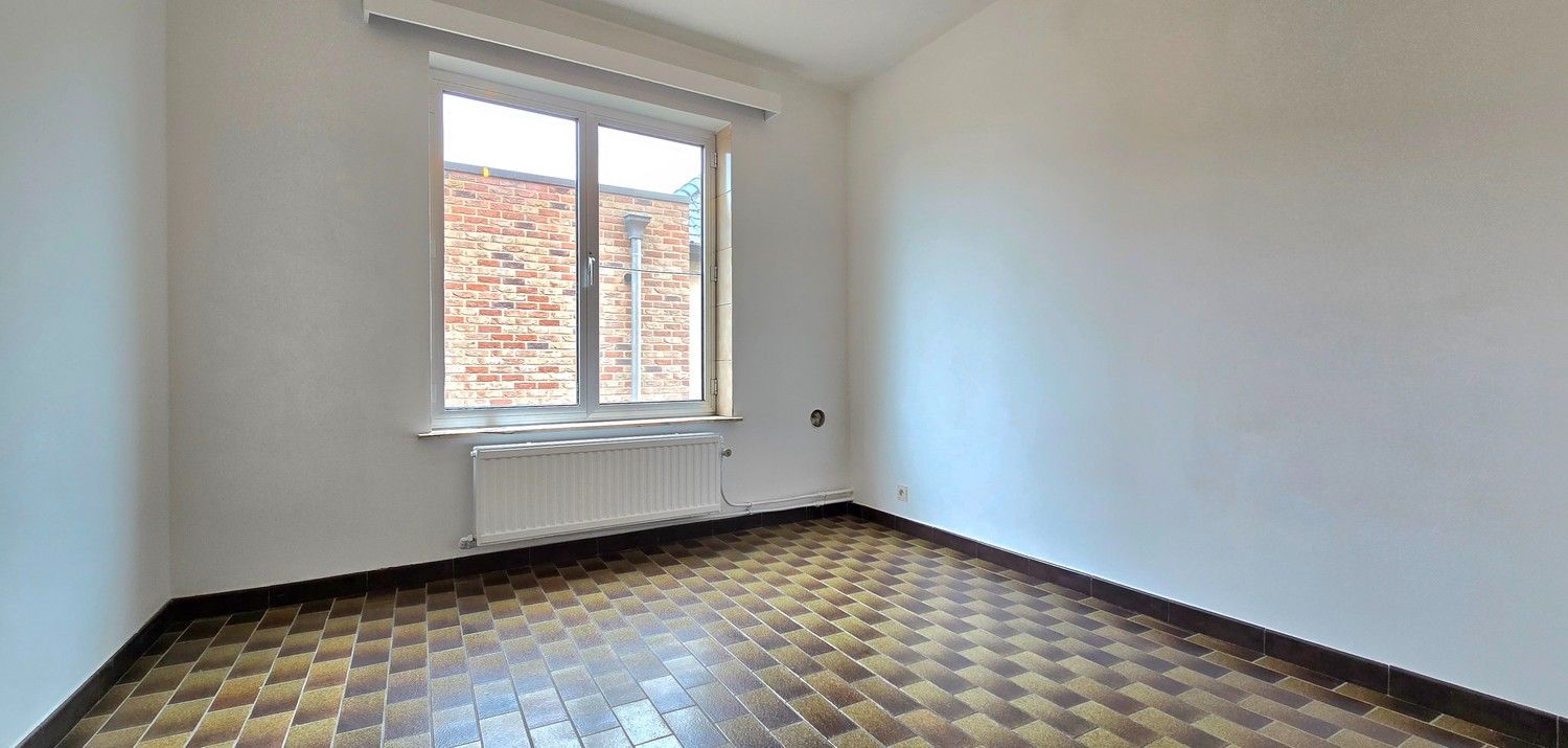 Instapklaar 2-slaapkamer appartement met garage, autostaanplaats en kelderberging foto 9