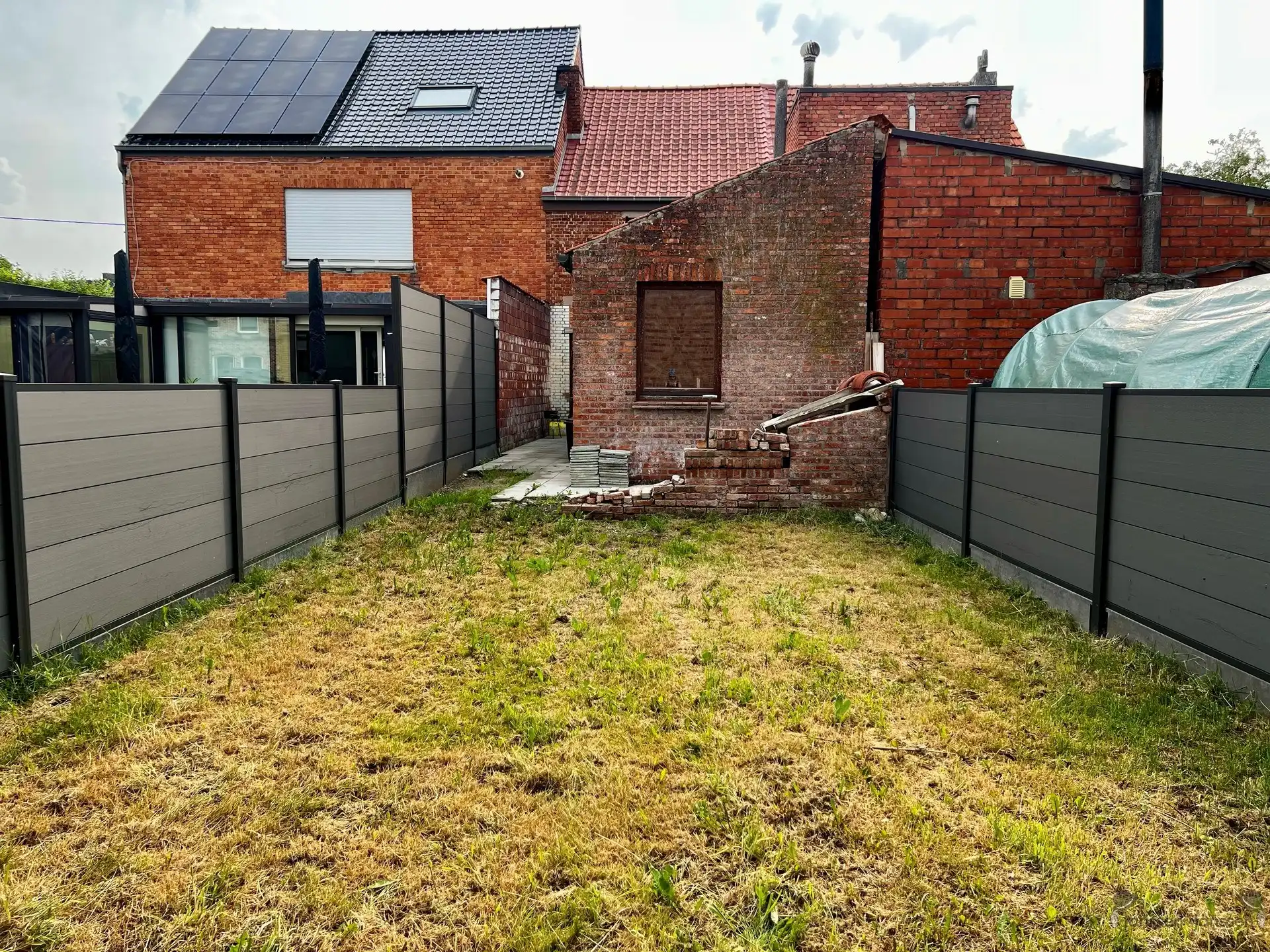 Te renoveren rijwoning met tuin foto 8