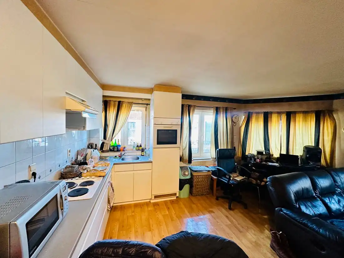 Aantrekkelijke opbrengsteigendom in het hart van Kuringen! foto 10