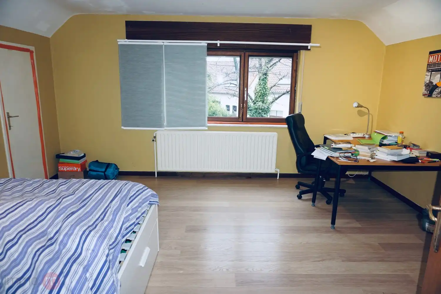 Rustig gelegen woning met 4 slaapkamers, bureau (of extra slaapkamer), garage en grote tuin. foto 15