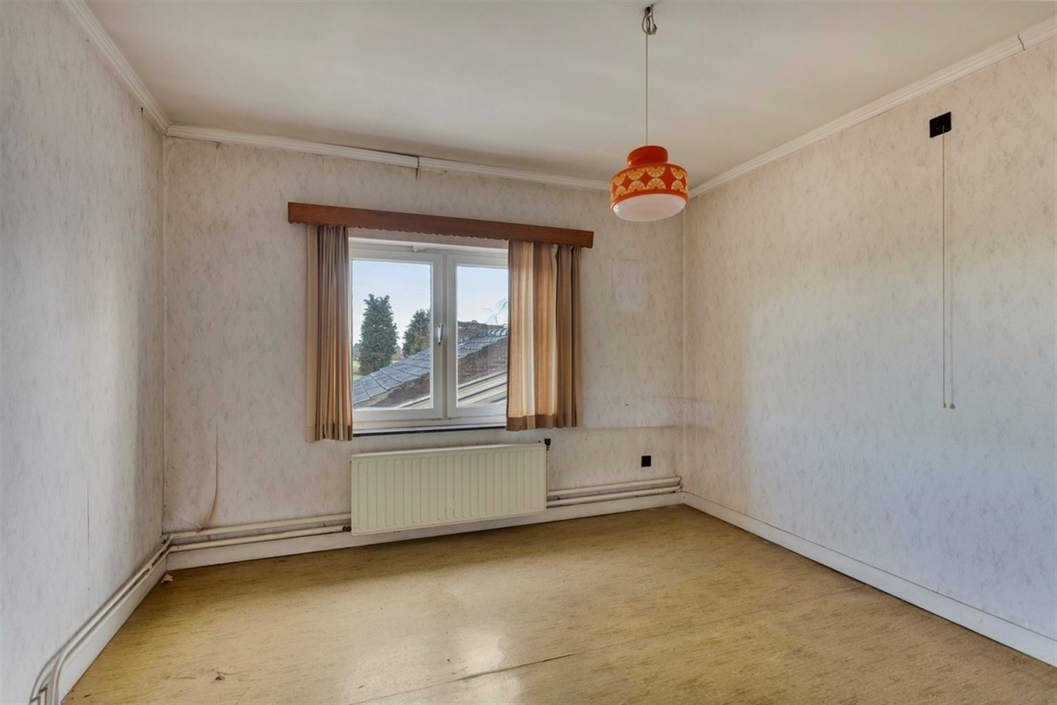 Ruime, halfopen gezinswoning op een perceel van 8a 8ca met 3 slaapkamers, grote tuin en oprit. Centraal gelegen nabij het centrum van Kinrooi. foto 20