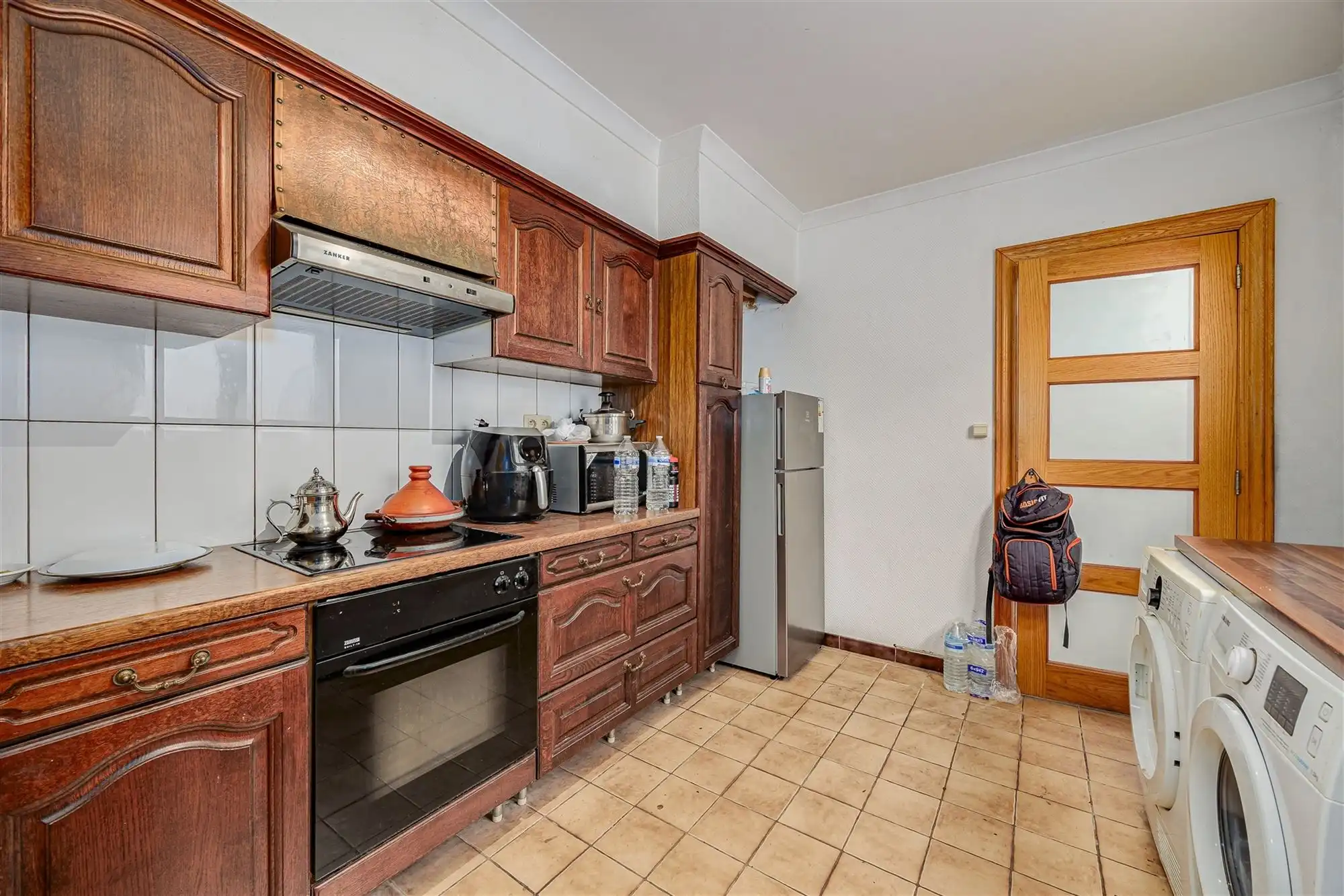 Woning met koer thans ingedeeld in 2 appt foto 13