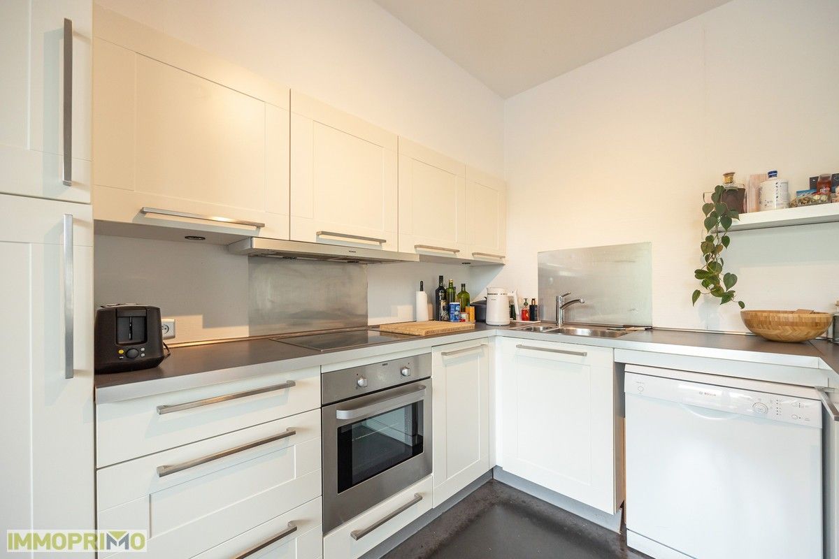 Ruim appartement met 3 slaapkamers en terras van 12 m2. foto 6