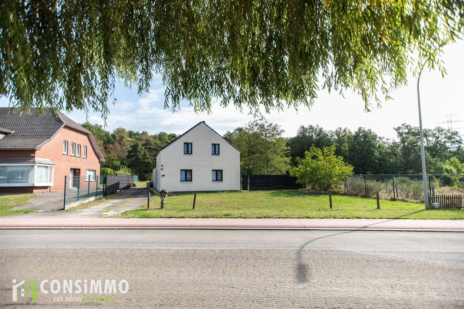 Vrijstaande, gerenoveerde woning op ruim perceel in het groene Genk-Sledderlo foto 3