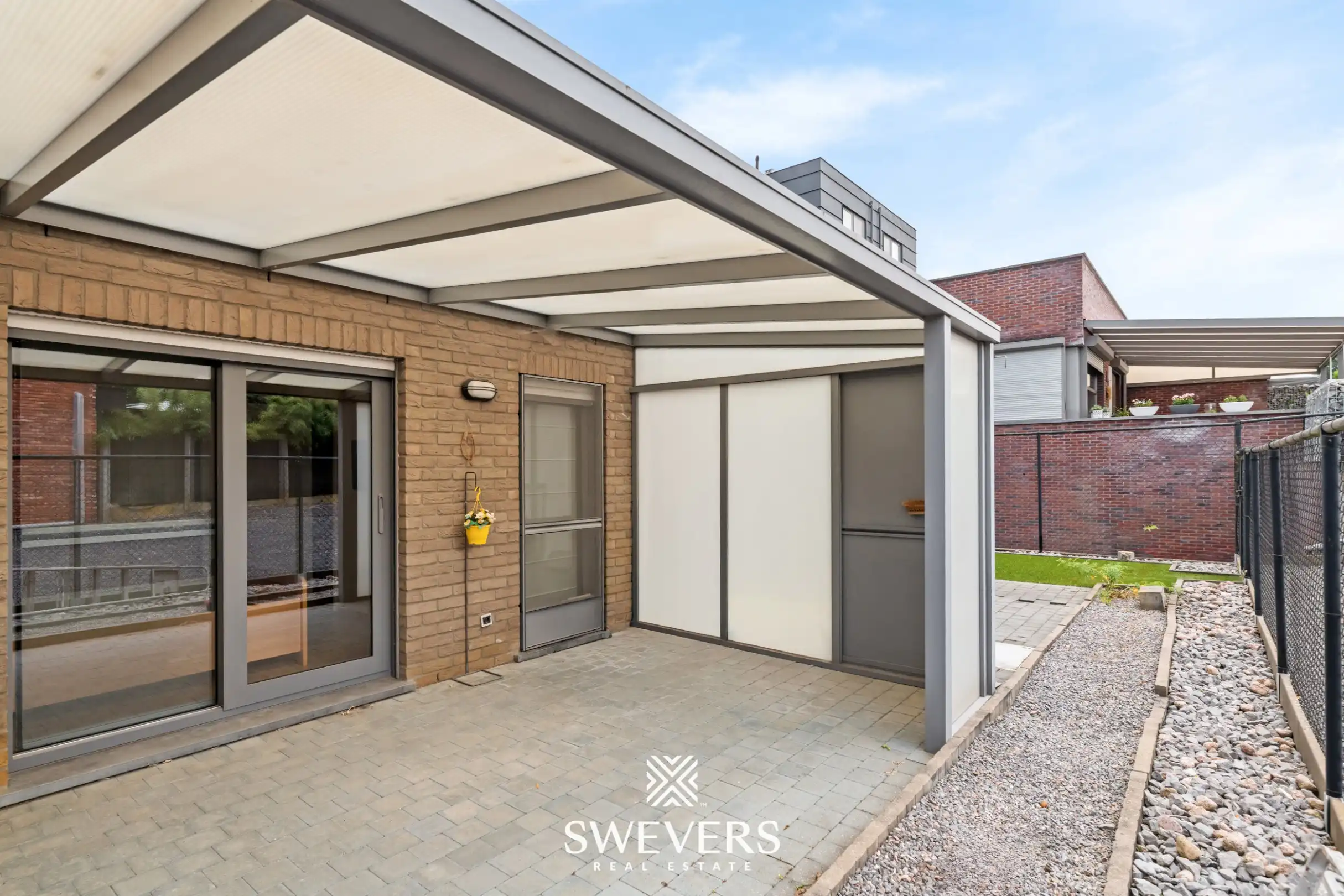 Ruim gelijkvloers appartement met tuin en ondergrondse autostaanplaats foto 26