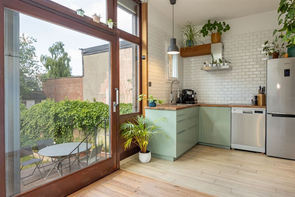 Gelijkvloers appartement met tuin en garage foto 4