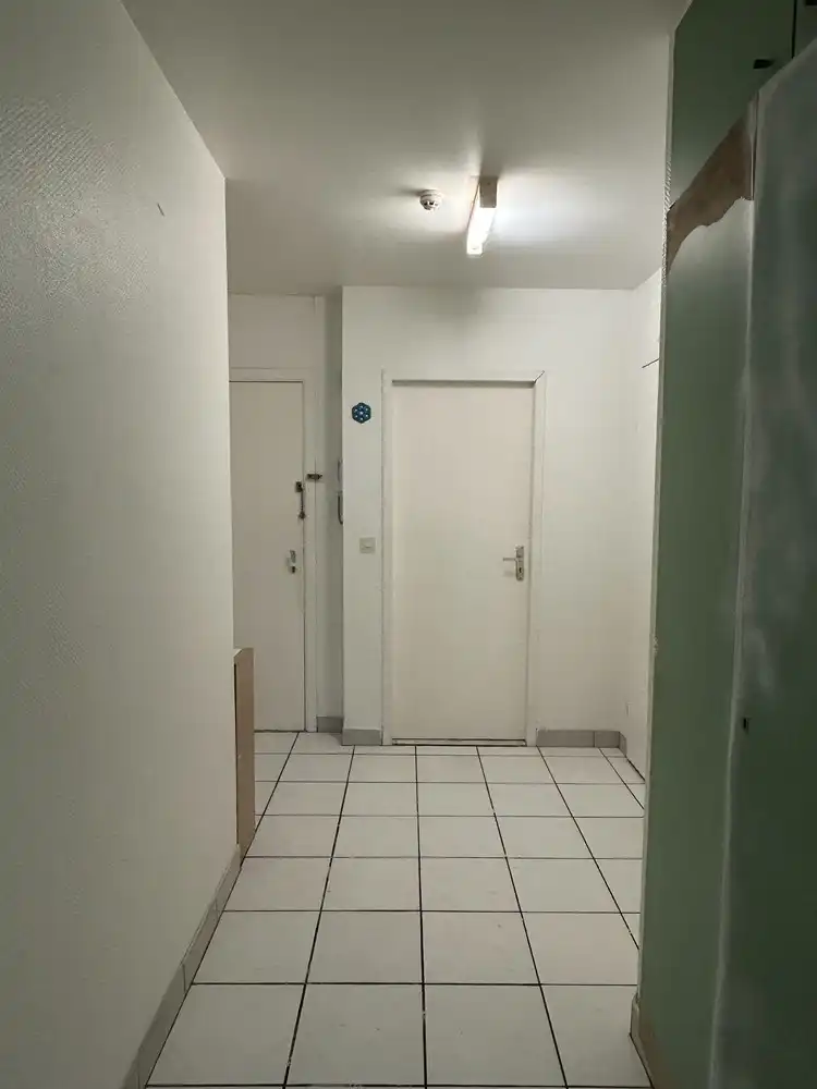 Op te frissen 1-slaapkamerappartement met autostaanplaats en kelder foto 6