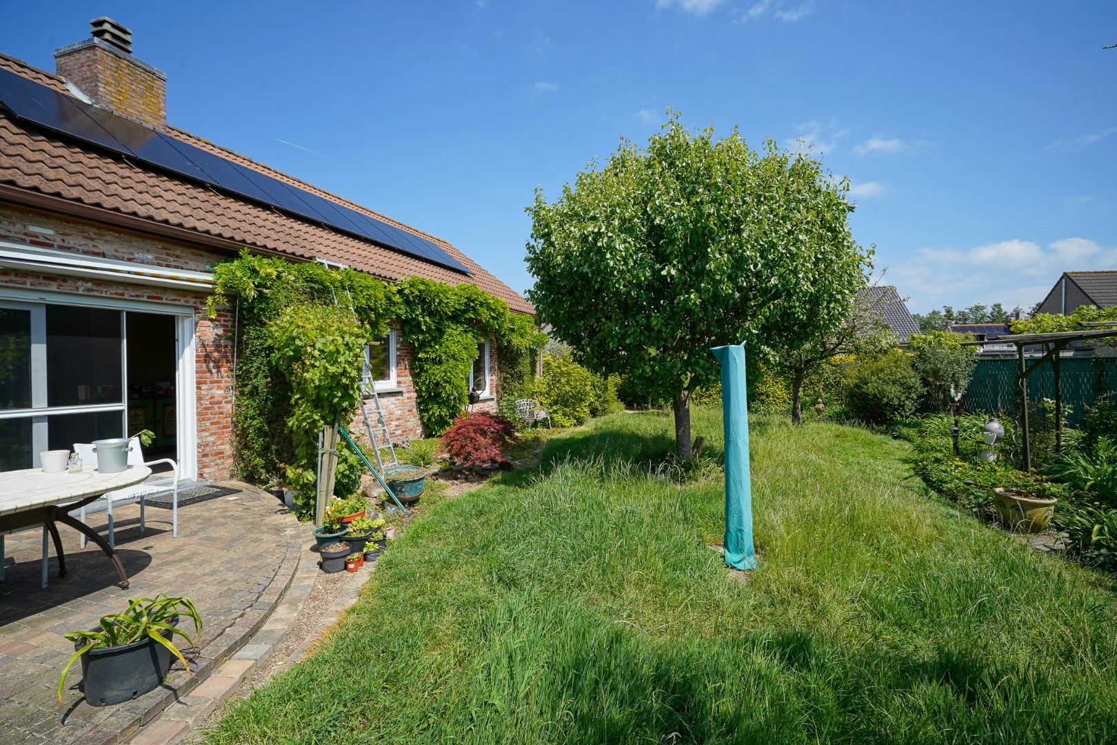 Ruime woning in Oudenburg met zongerichte tuin foto 22