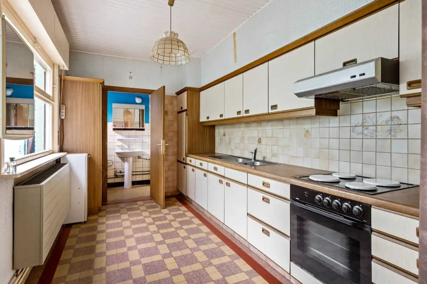 Te renoveren woning met 3 à 4 slpk. en inpandige garage foto 6