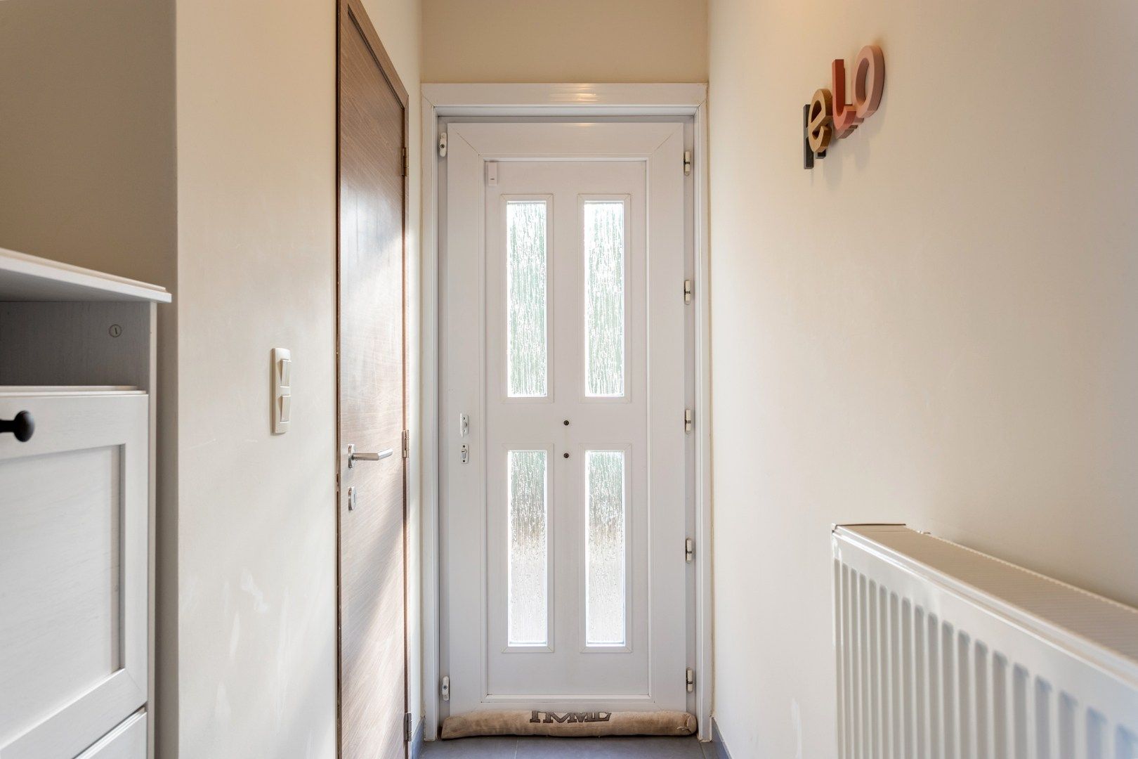 Rustig gelegen halfopen woning met tuin en garage foto 3
