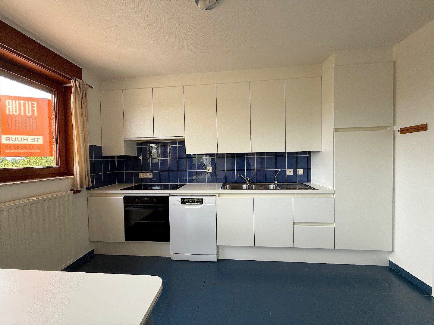 Ruim 3-slpk appartement met garage foto 7