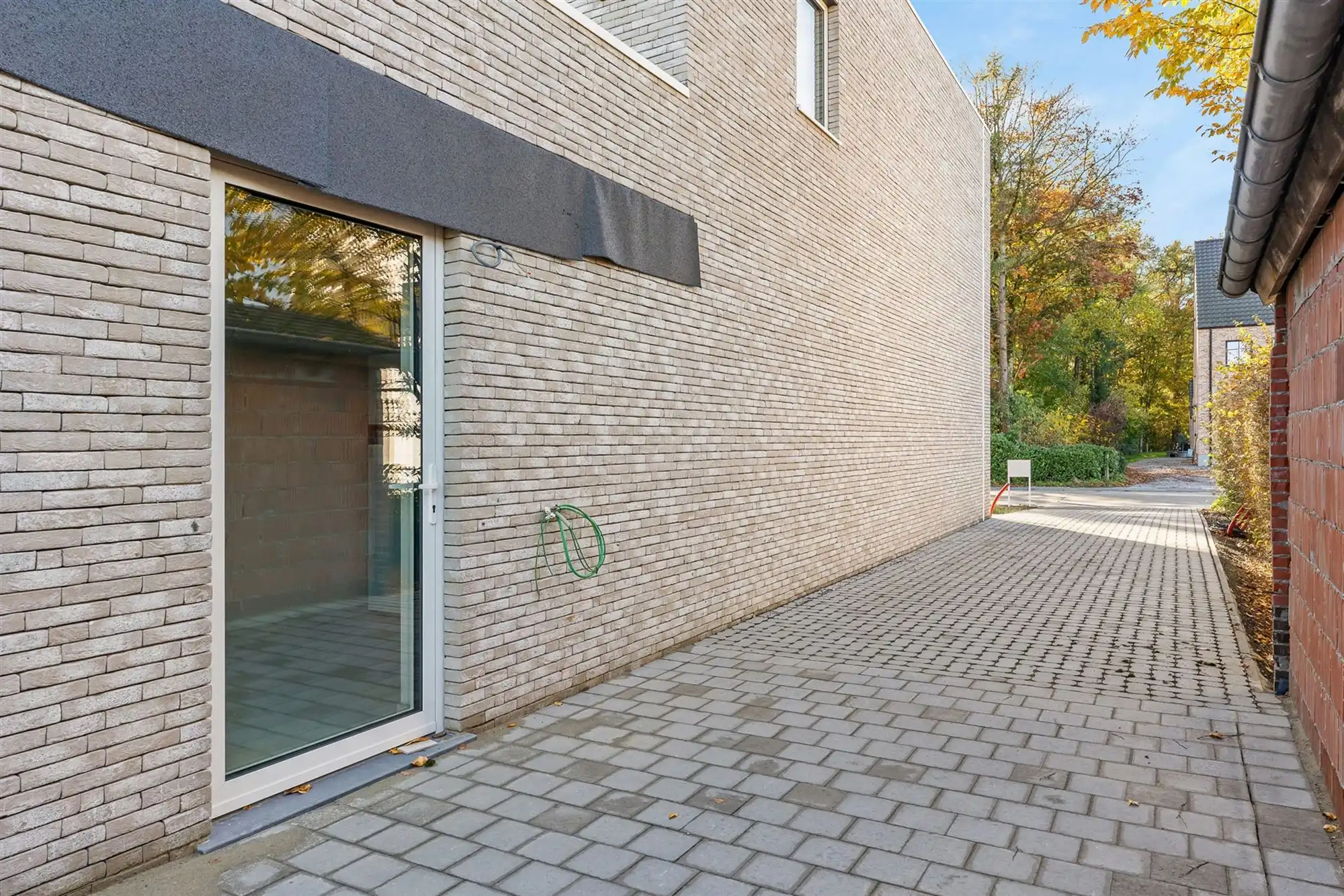 NIEUWBOUW OPEN BEBOUWING MET UITERST KWALITATIEVE EN ENERGETISCHE AFWERKING TE BERINGEN  6% BTW MOGELIJK foto 2