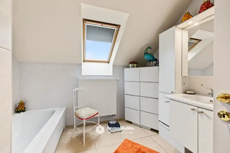 RUIM DAKAPPARTEMENT MET 3 GARAGES EN ZALIG DAKTERRAS TE KOOP foto 15
