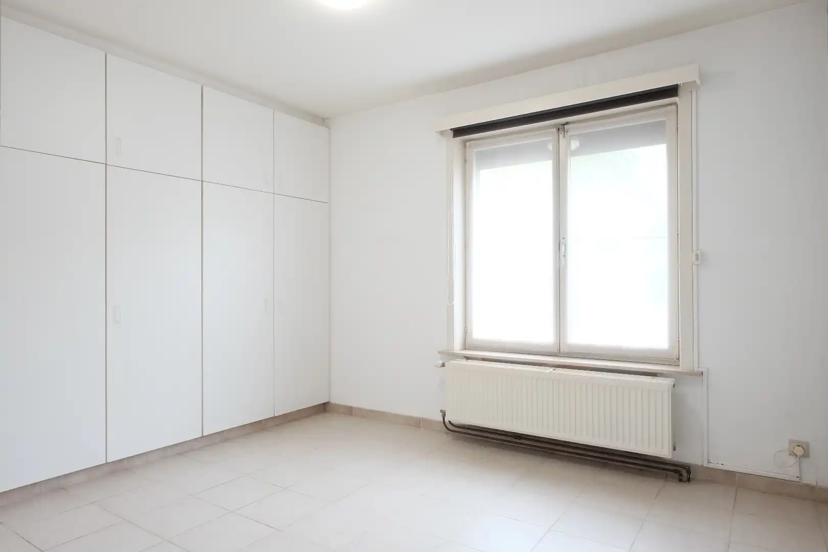 Centraal gelegen gelijkvloers 2-slaapkamerappartement — ideaal als starter of opbrengsteigendom foto 11