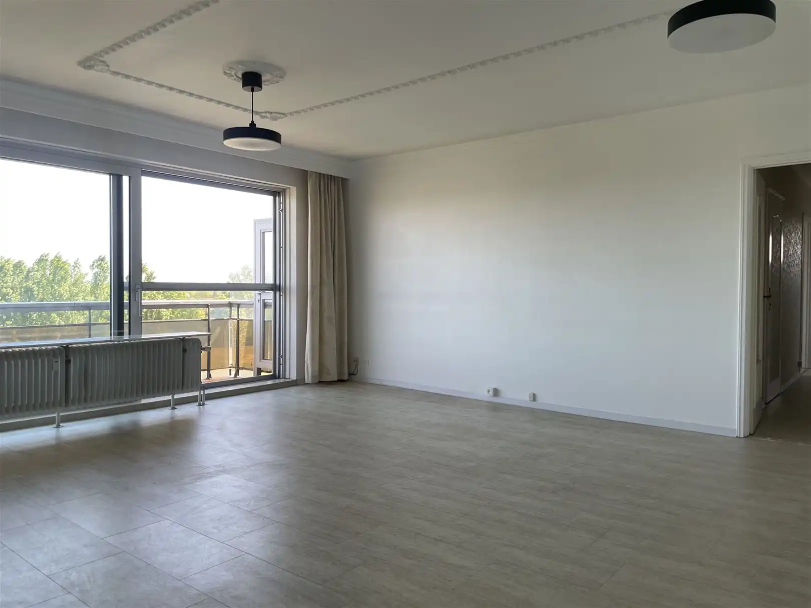 Ruim en zonnig appartement ca. 113m2 met groen uitzicht foto 2
