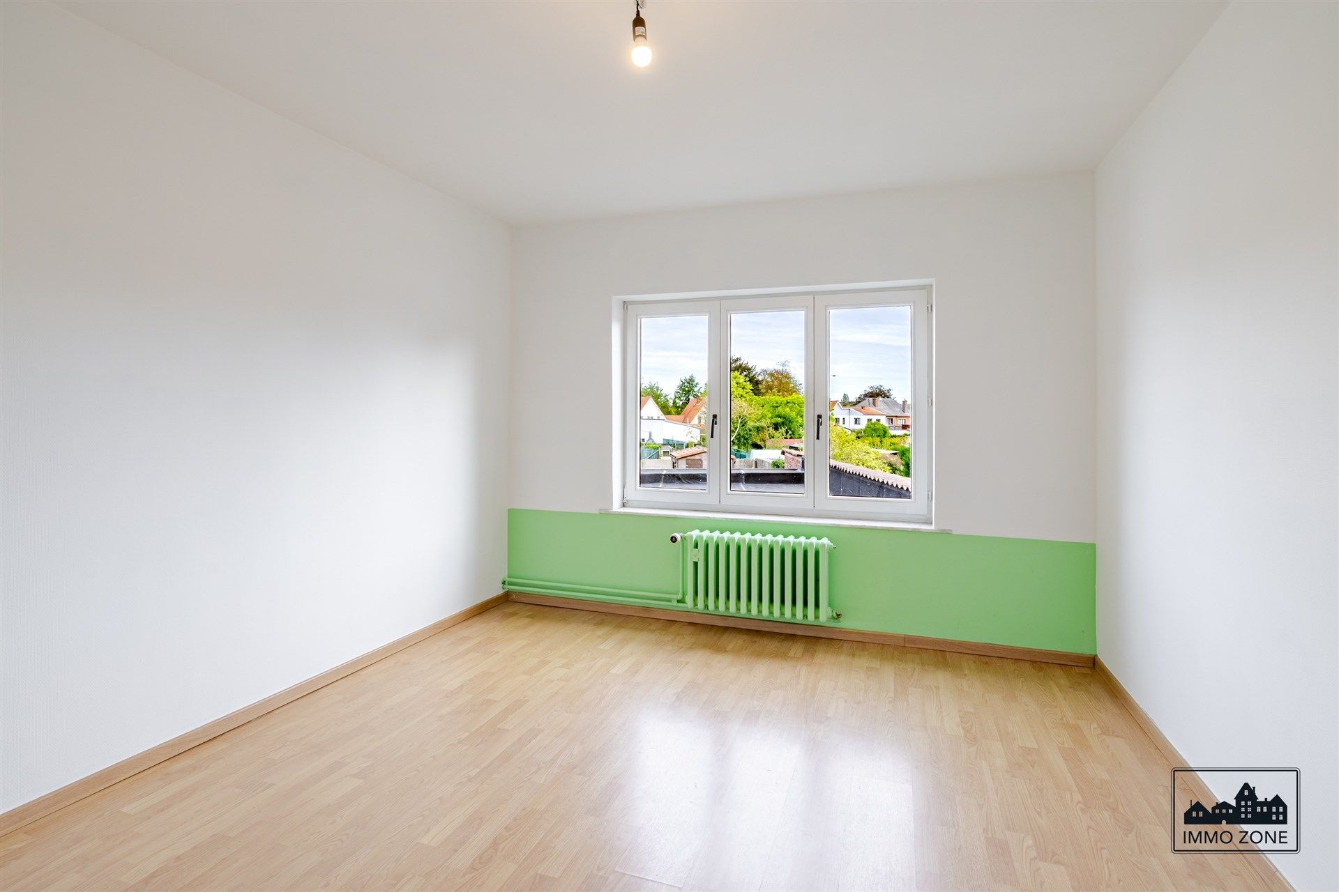 Lichtrijke halfopen woning te Nieuwerkerken! foto 11