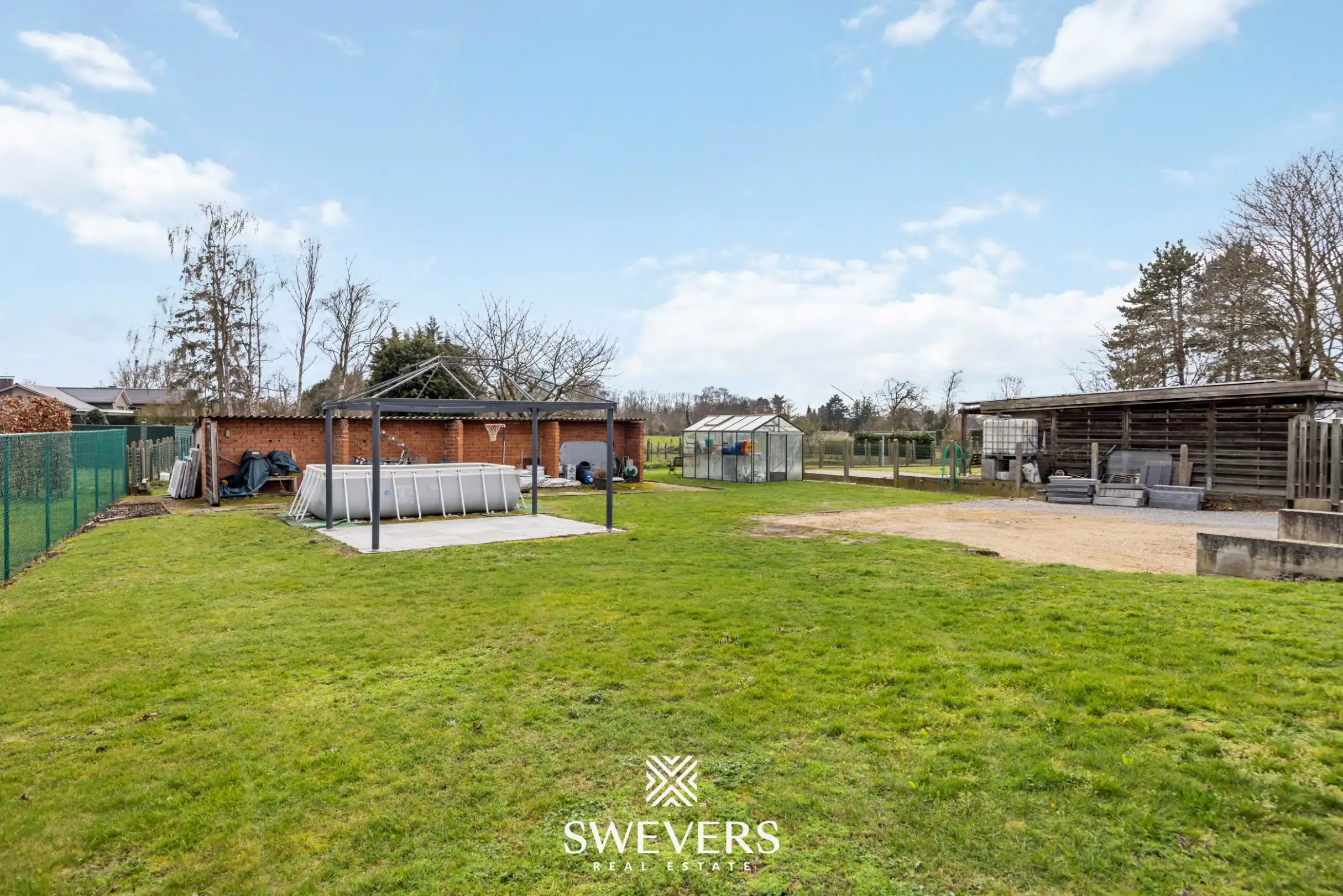 Zonnige woning met ruime zuid georiënteerde tuin in het rustige Diepenbeek foto 28