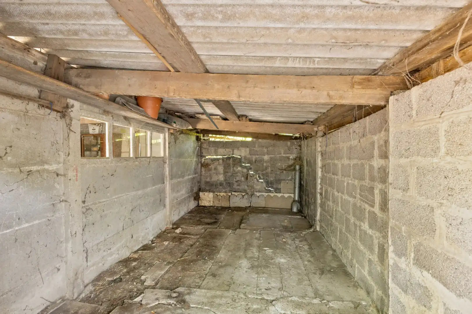 Ruime te renoveren woning met 3 slaapkamers in Lubbeek met doorgang langs het perceel van de buren. EPC: 736 KWH/m² foto 28