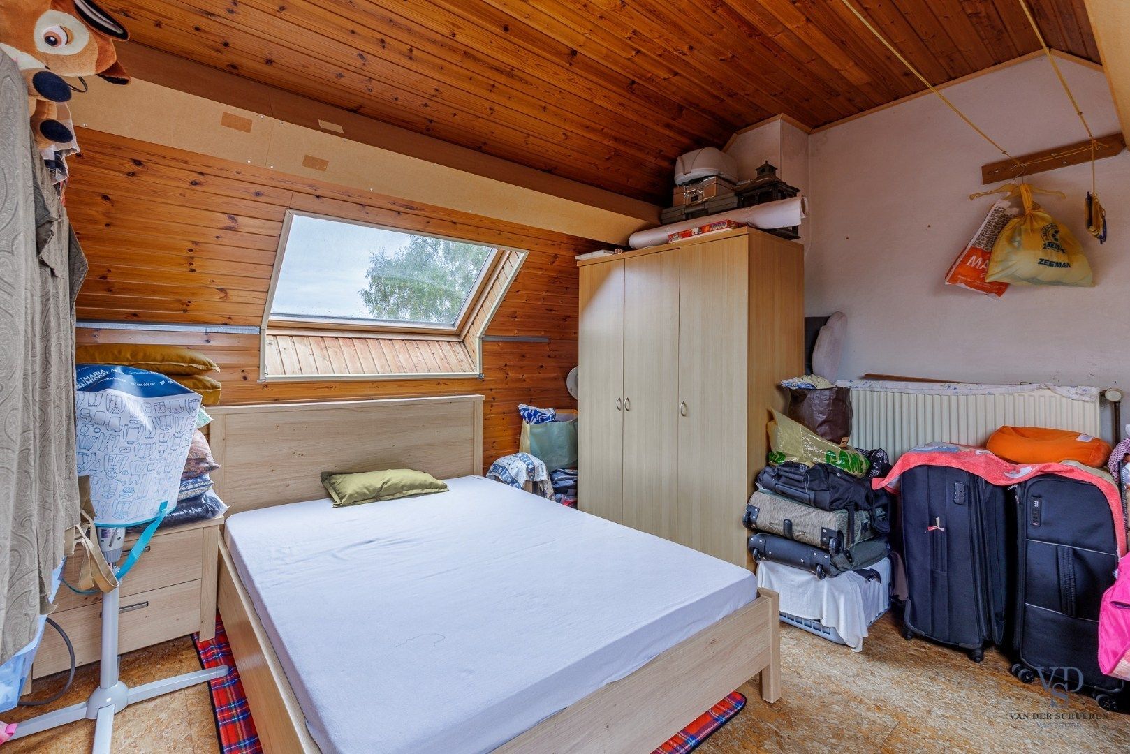 Energiezuinige woning met tuin (en 2 staanplaatsen). foto 23