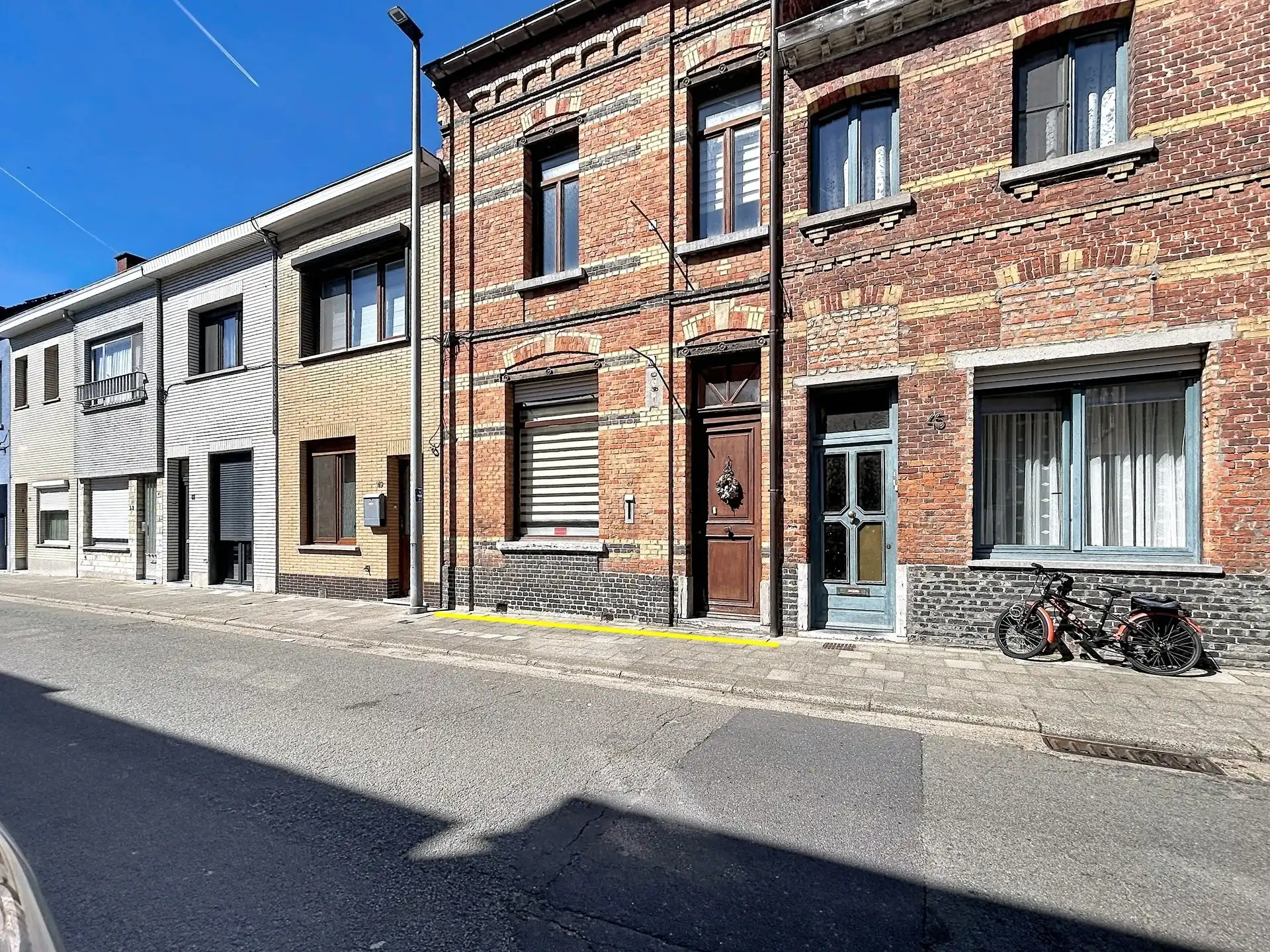 Charmante gezinswoning met 3 slaapkamers en aangename veranda! foto {{pictureIndex}}