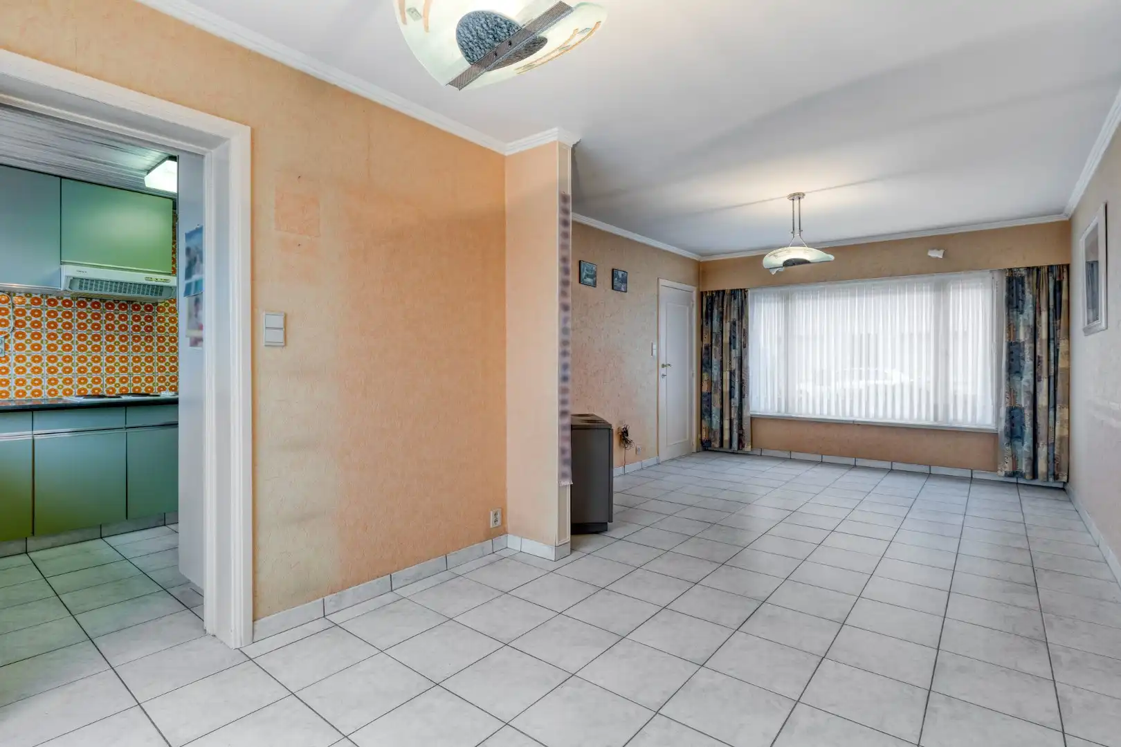 Te renoveren woning met 4 slaapkamers, garage en tuin op rustige ligging! foto 3