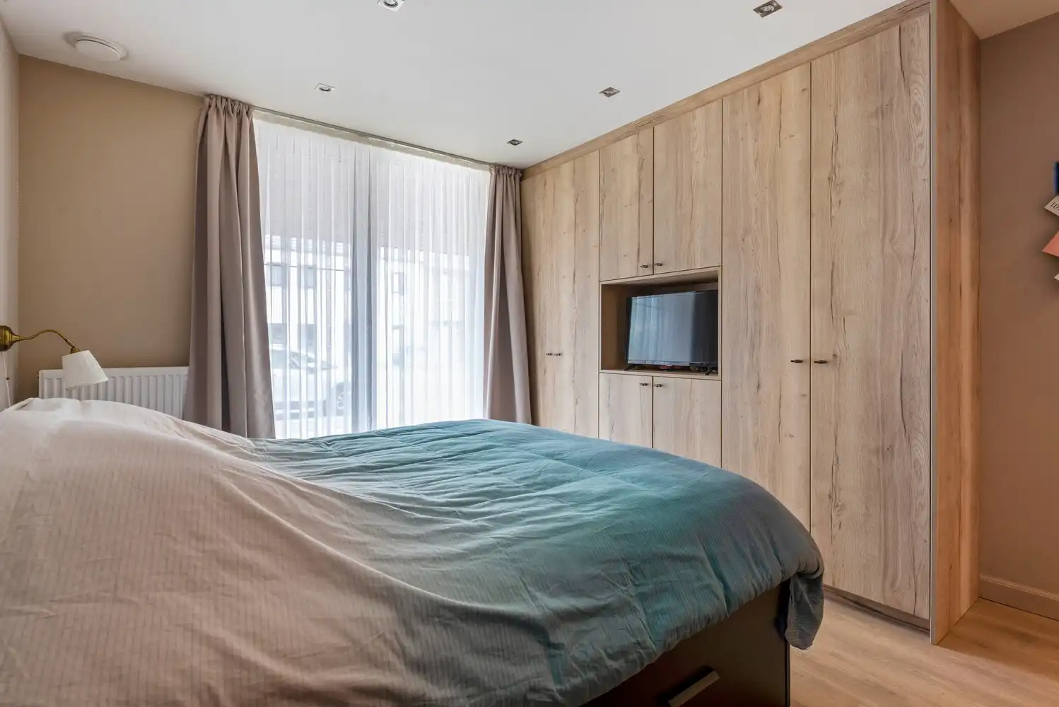 Instapklaar, recent gelijkvloers appartement met 2 slpks en tuin in Borsbeek! foto 8