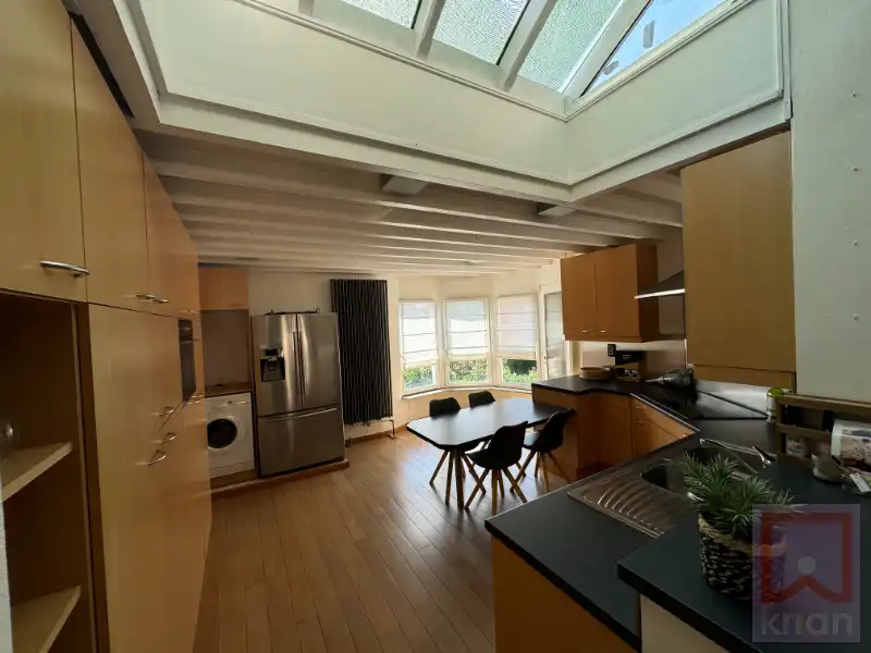 Ruime veelzijdige woning, inpandige garage en 4 slaapkamers op zuidgericht perceel! foto 5