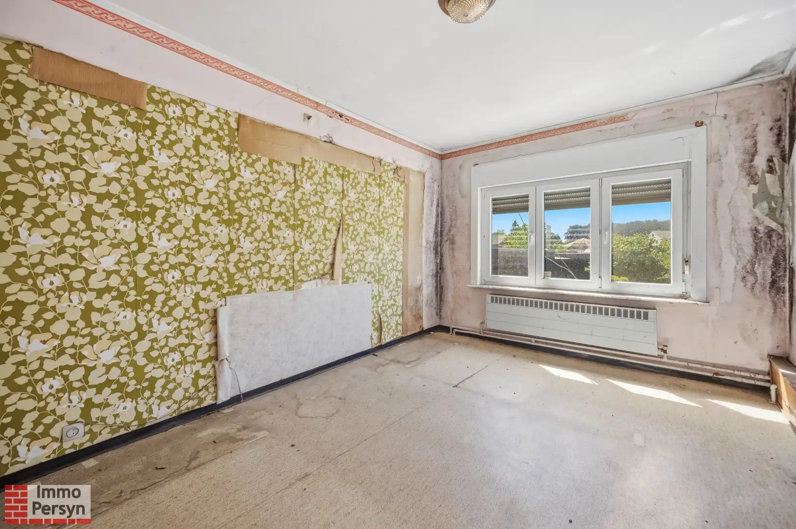 Te renoveren rijwoning met tuin in hartje Zichem foto 9